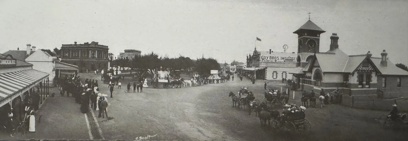 Historic street scene in Terang with people and horse-drawn vehicles